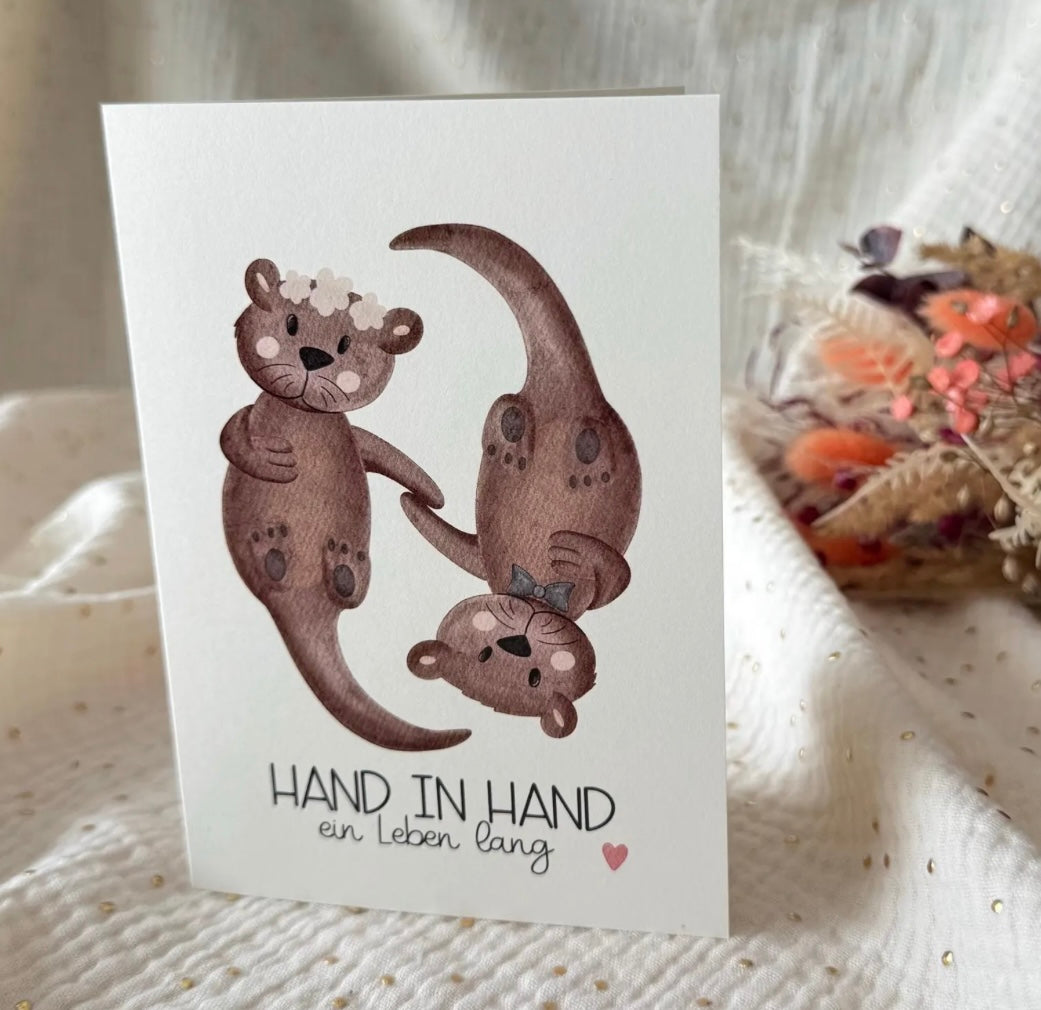 Klappkarte Hand in Hand Otter - Doerrtoparadise