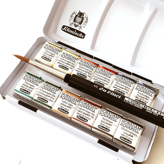 Schmincke Horadam Aquarellfarben – Metallkasten mit 12 halben Näpfchen