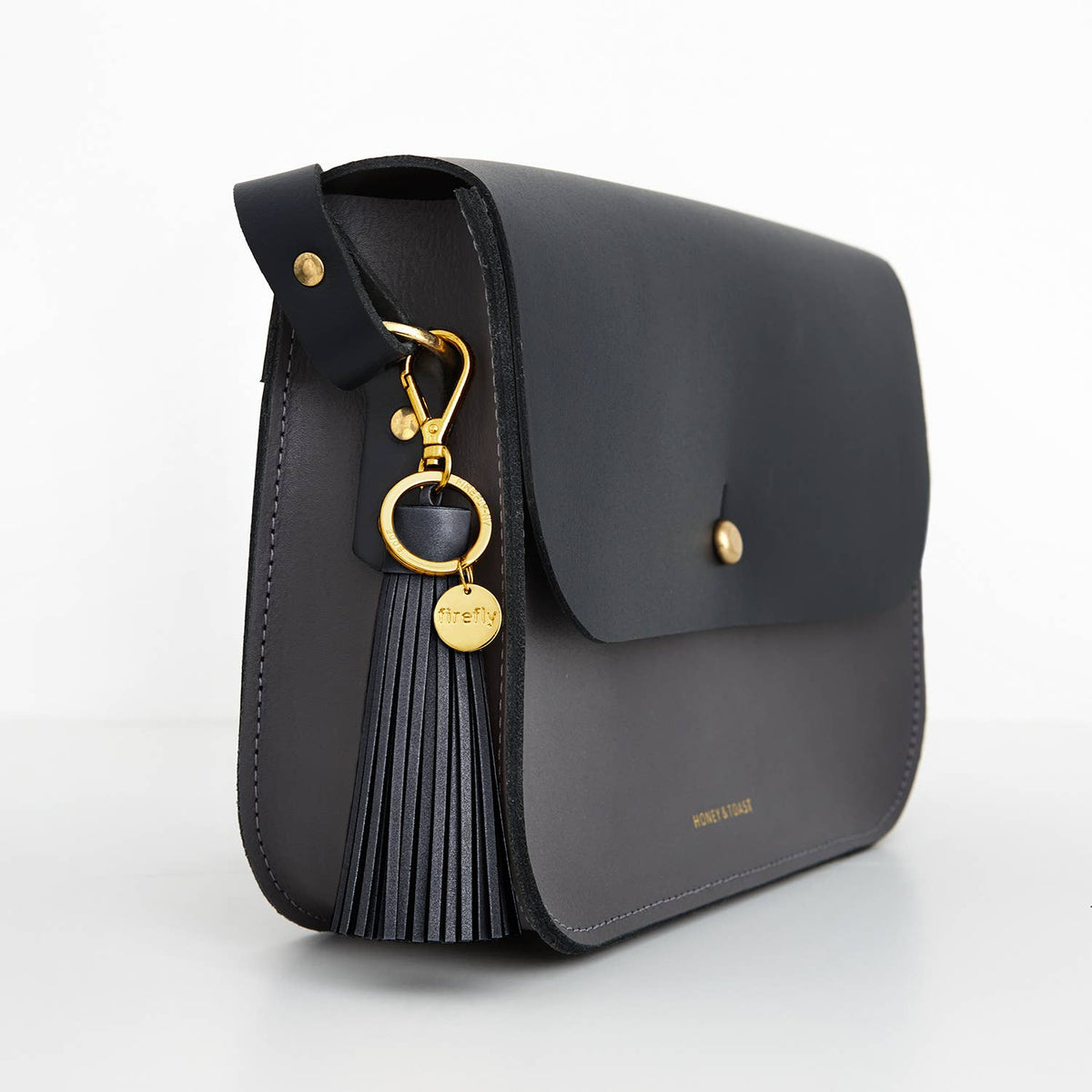 Firefly Reflectors - Weicher Quastenreflektor – Dunkles Denim / Gold